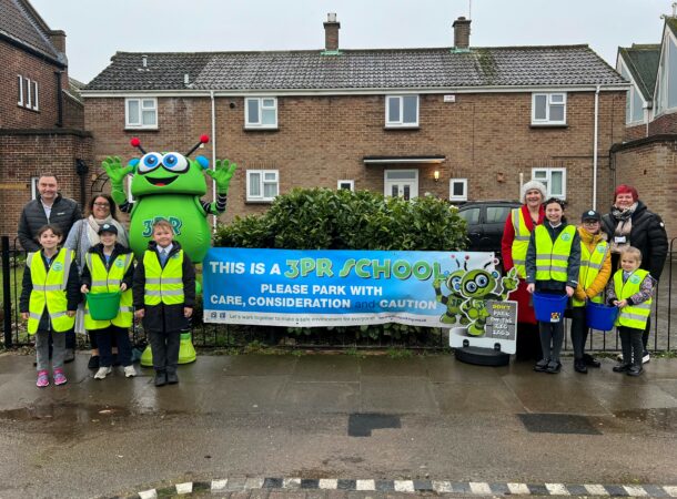 Photo of 3PR launch at St Teresa’s Catholic Primary School in Colchester on 10 January 2023: (Not in order) Councillor Martin Goss (NEPP’s Member for Colchester City Council), Ward Councillors Sue Lissimore and Leigh Tate, Mrs Kelly (Headteacher of St Teresa’s Catholic Primary School), school pupils and the 3PR costumed-character.