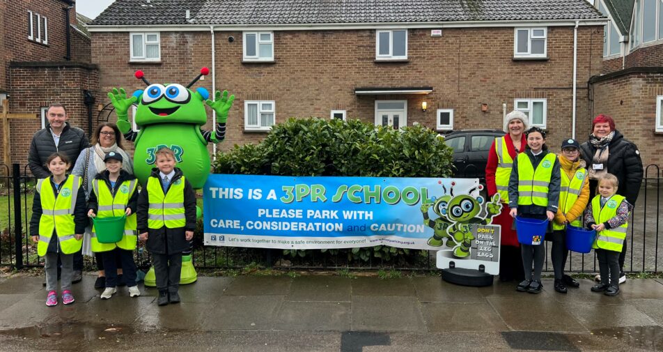 Photo of 3PR launch at St Teresa’s Catholic Primary School in Colchester on 10 January 2023: (Not in order) Councillor Martin Goss (NEPP’s Member for Colchester City Council), Ward Councillors Sue Lissimore and Leigh Tate, Mrs Kelly (Headteacher of St Teresa’s Catholic Primary School), school pupils and the 3PR costumed-character.